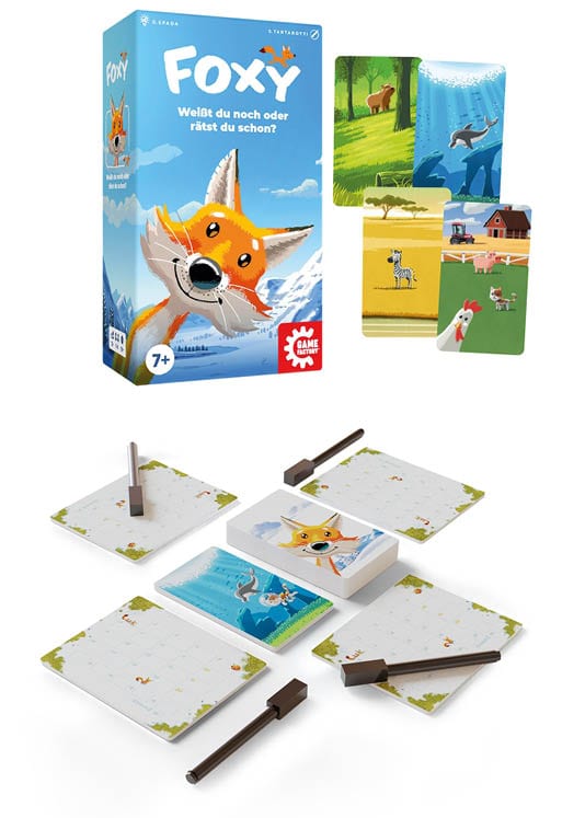 Auf dem Tisch: die blaue Foxy-Packung von Game Factory und Landschaftskarten mit Tieren, passend zum Spiel „Weißt du noch oder rätst du schon?“