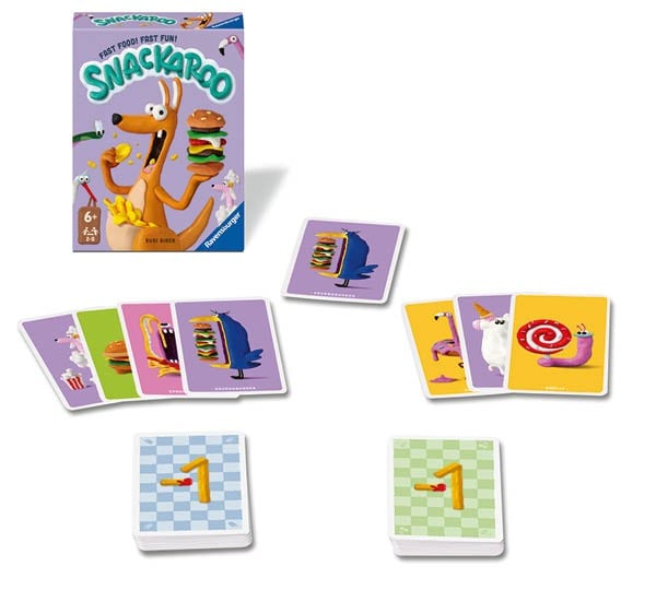 Bunte Spielkarten von Snackaroo von Ravensburger mit Snack-Motiven und Kartenstapeln, darunter eine lila Karte sowie gelbe Variante für schnelles Spieltempo.